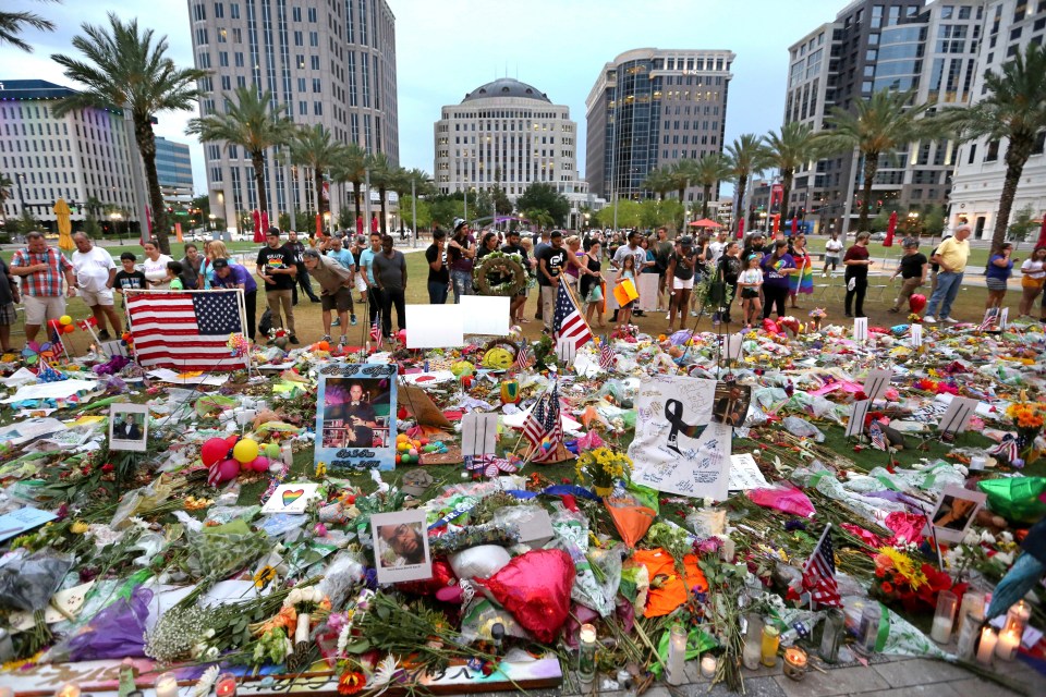  Visitors have created a makeshift memorial in Florida to remember the victims