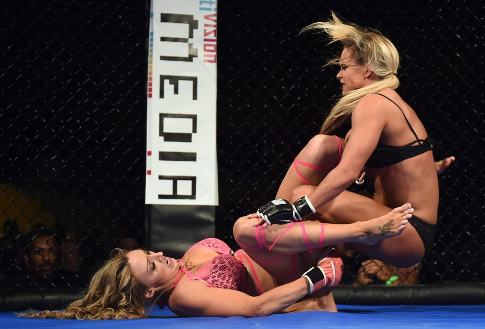  Cali Cat (L) and Lauren "The Animal" Fogle took grappling to a new level during their fight