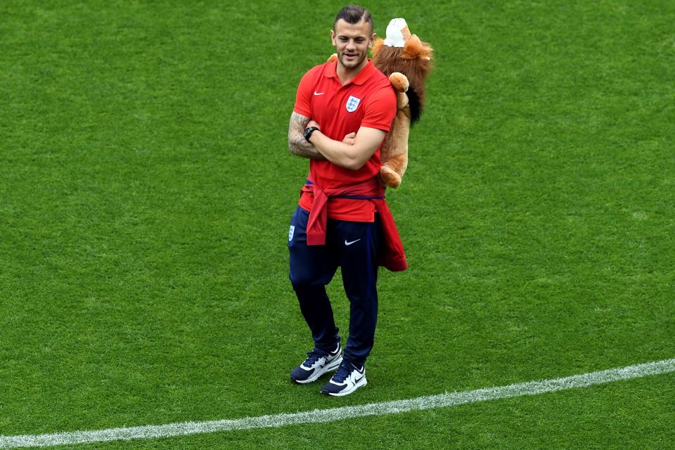 England midfielder Jack Wilshere, carryi