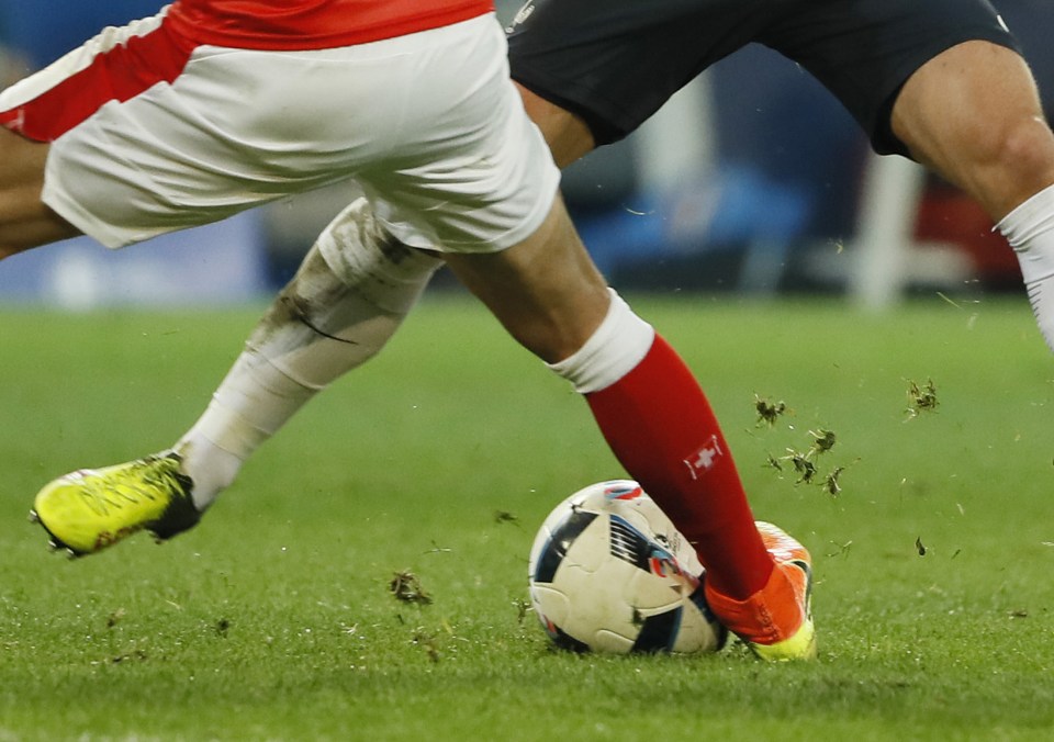  Valon Behrami challenges Antoine Griezmann resulting in the ball to burst