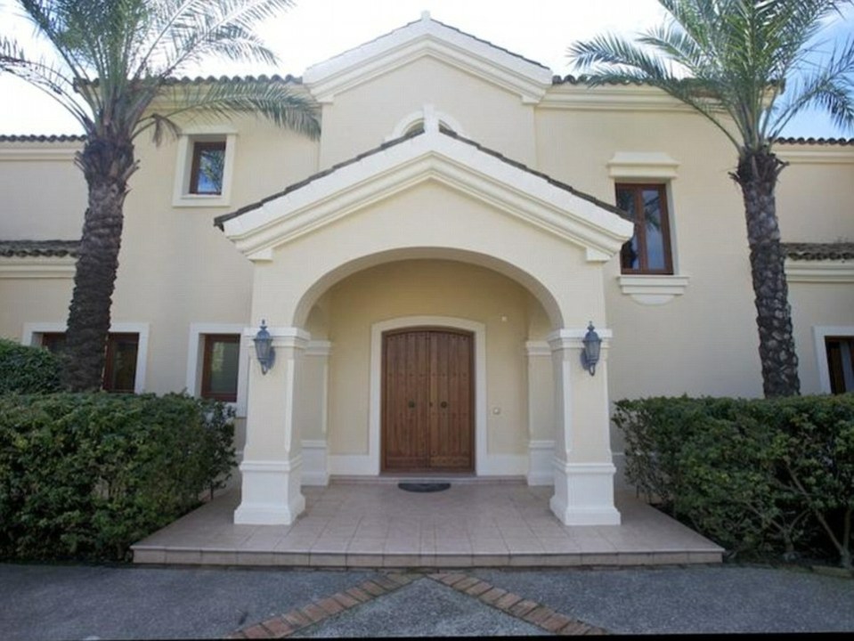  The imposing entrance leads to a spacious, airy property