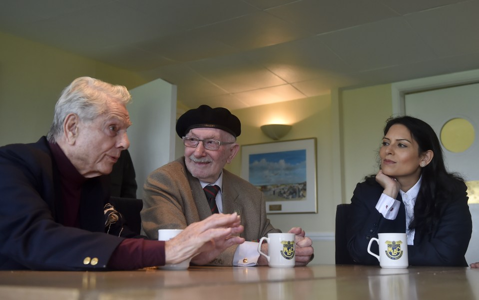  Flying Officer Bryan Neely (left) and Corporal Donald Williams tell Priti Patel of their EU fears