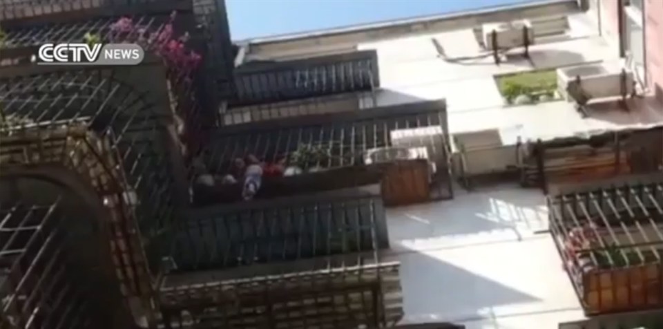  Firefighters rushed to rescue a three-year-old boy whose head got stuck in the bars of a balcony