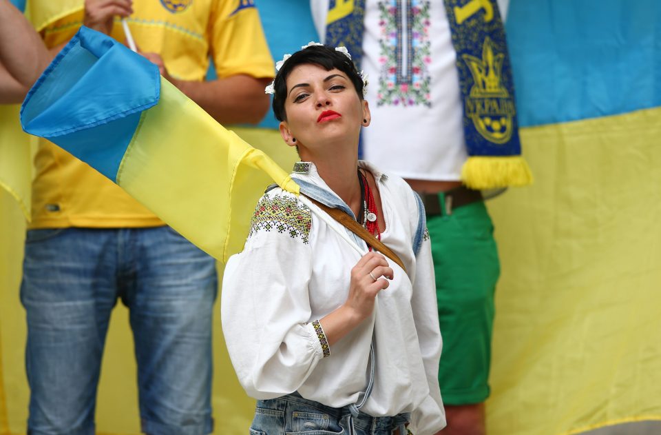 A Ukrainian supporter poses outside the stadium in Marseilles