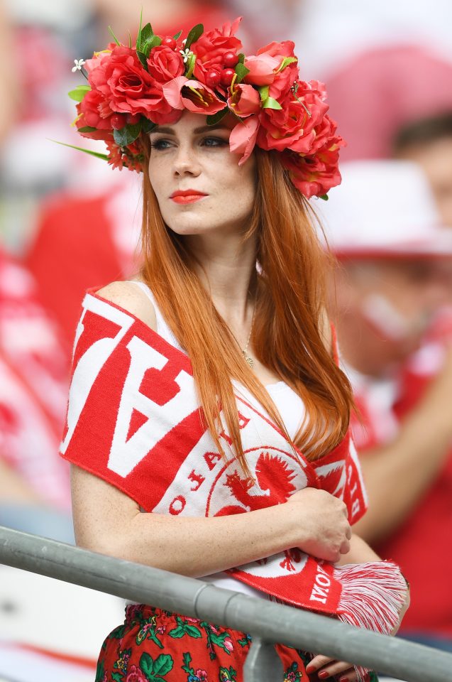 Another fan opts for floral headgear for the Group C clash