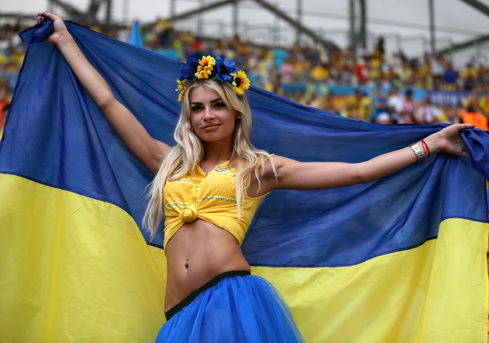 A Ukraine fan in the Stade Velodrome stands show her support