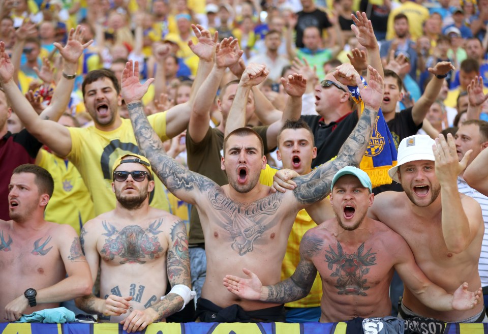 Ukraine fans in the stands show their support