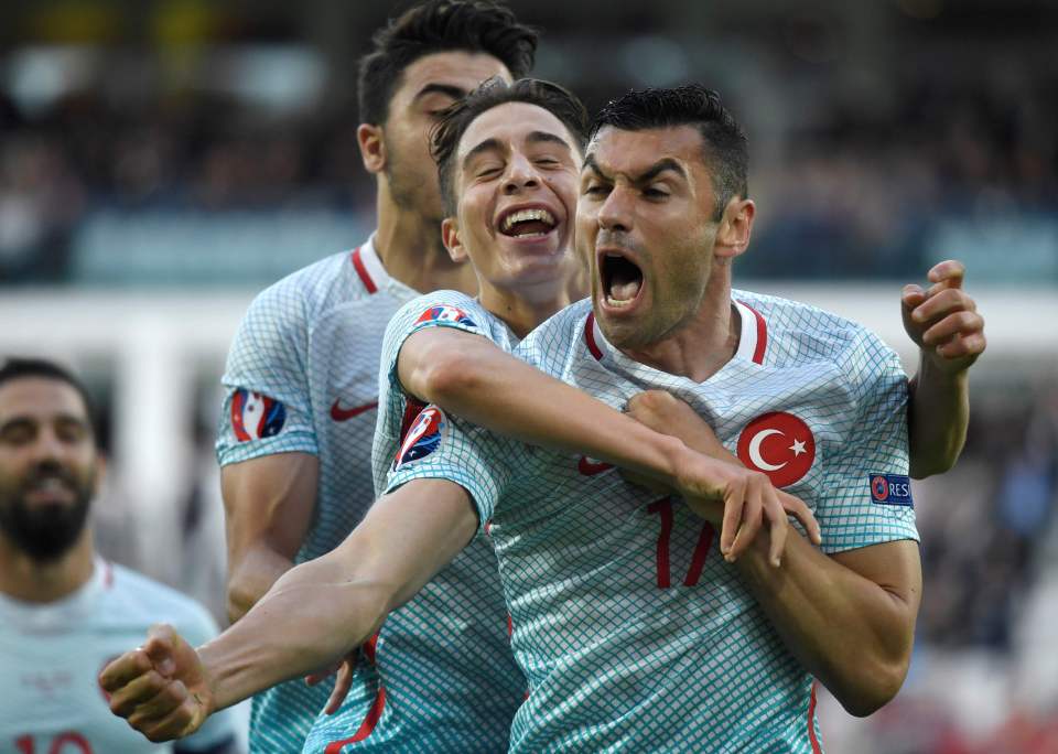  Turkey's forward Burak Yilmaz screams with delight after opening the scoring