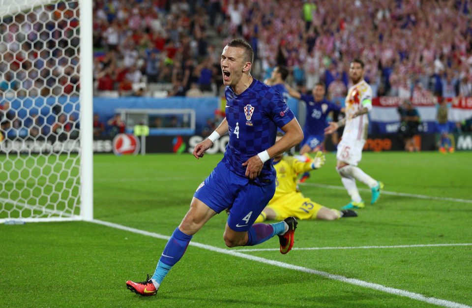  Ivan Perisic scored a late winner as Croatia beat Spain to finish top of the group