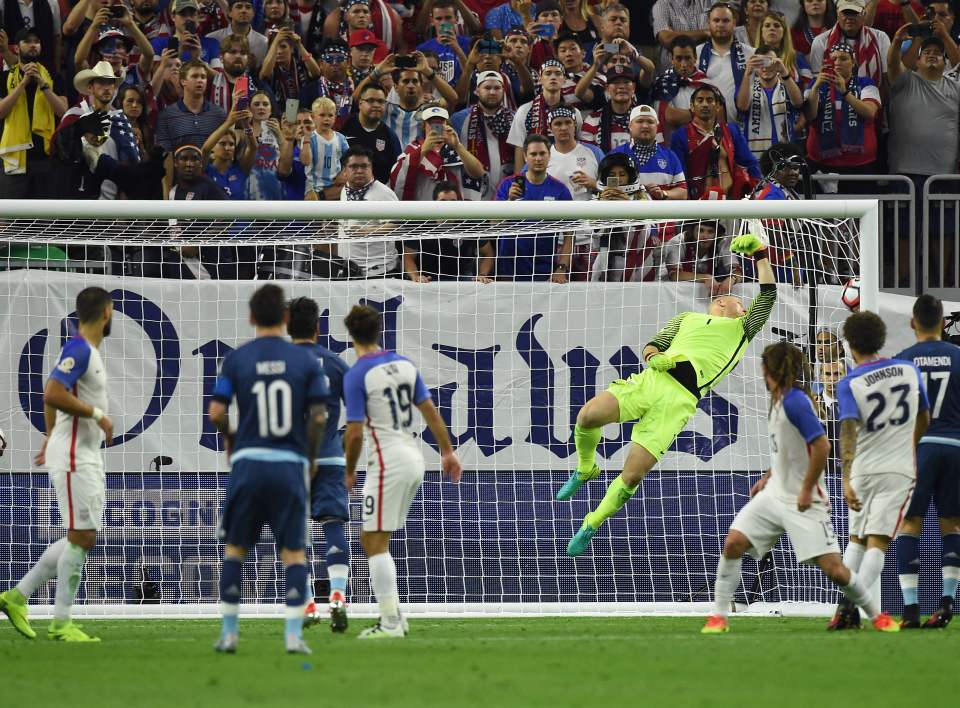 Argentina's Lionel Messi (2-L) scores a