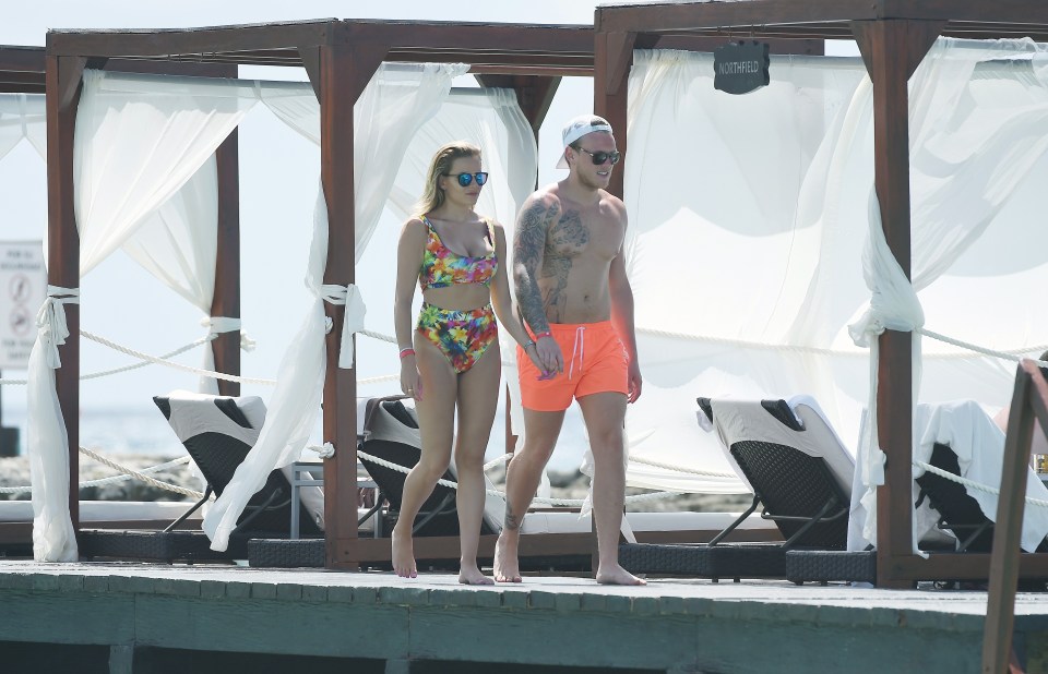  The couple walked hand in hand around the resort in the warm Mexican sunshine