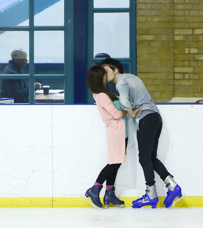 After skating around, the couple headed to the side to take a breath, and share a kiss 