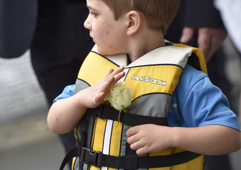  Cuillin Cox, the son of murdered MP Jo Cox, arrives by boat to attend a special service at Trafalgar Square in London