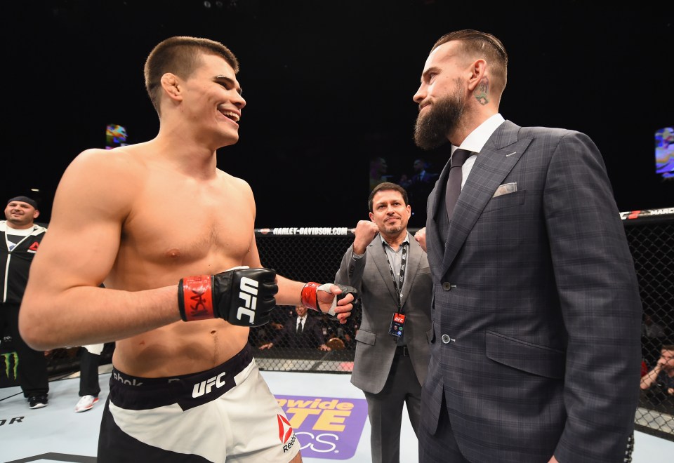  Future opponents: Mickey Gall and CM Punk chat in the Octagon after Gall's successful UFC debut