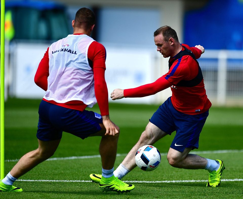 Rooney turns inside Ross Barkley during England training in Chantilly