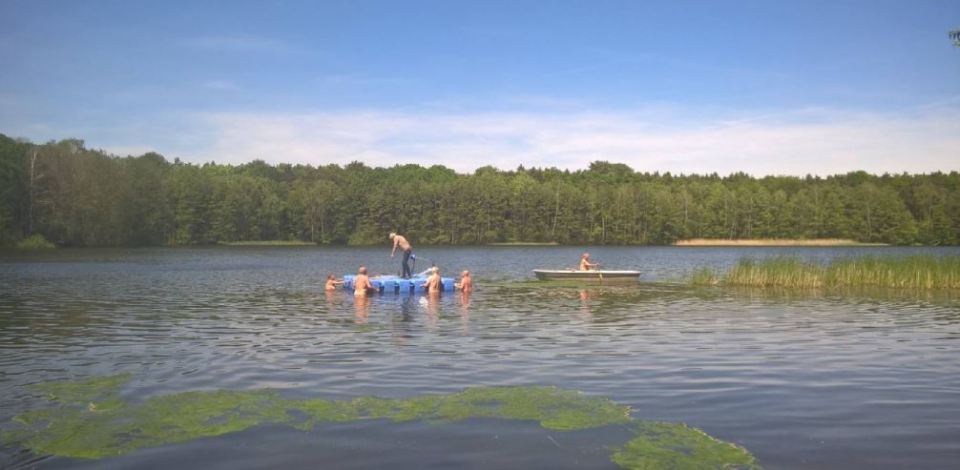  400 members of a historic nudist colony are protesting after officials told them they couldn't bathe naked as a group of refugees are moving in next door