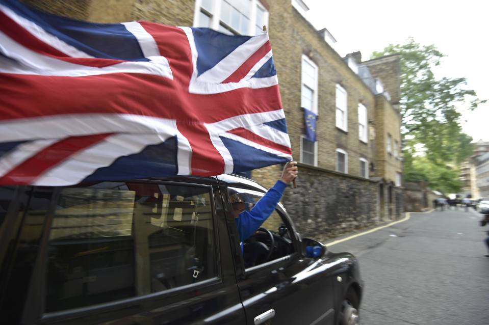  This taxi driver shows how happy he is about Britain's choice by flying the Union Jack from his cab