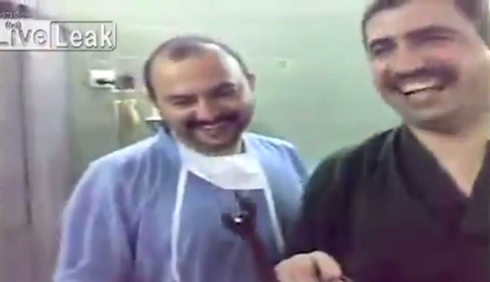  Doctors laugh after the difficult surgery proved to be a success