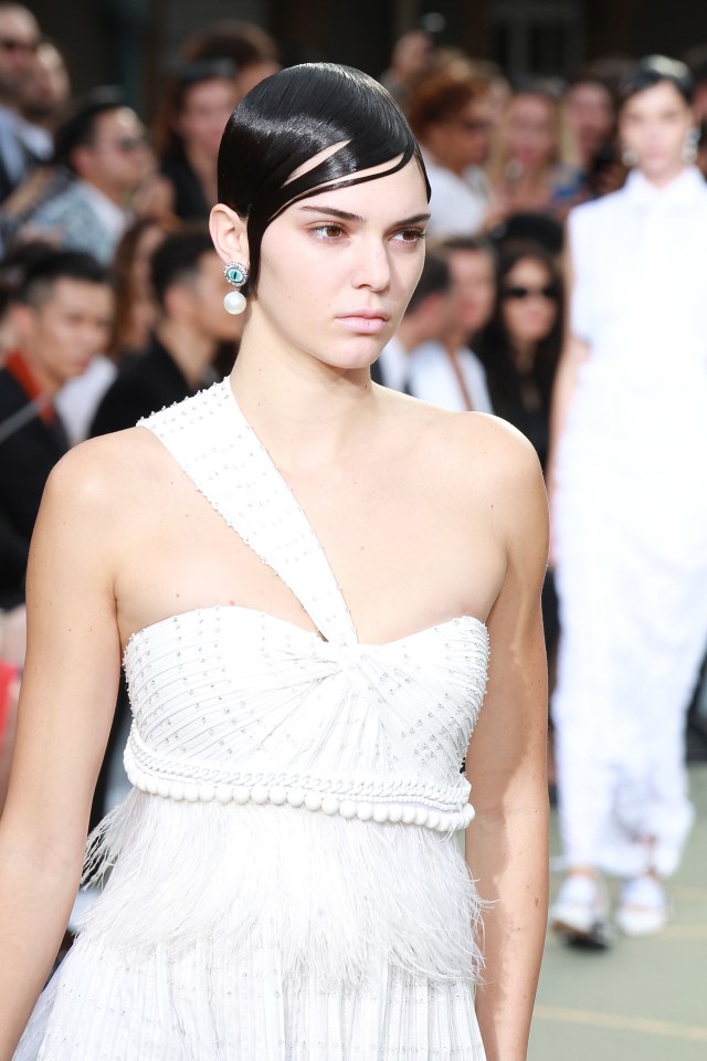  Despite her glum face, Kendall looked great on the catwalk