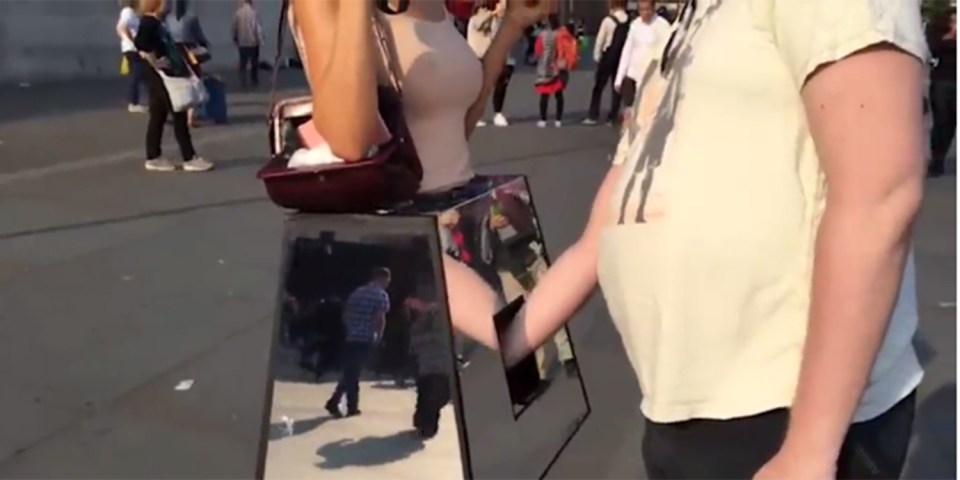  The Swiss artist wore a mirrored box with an opening, allowing volunteers to touch her breasts and genitals