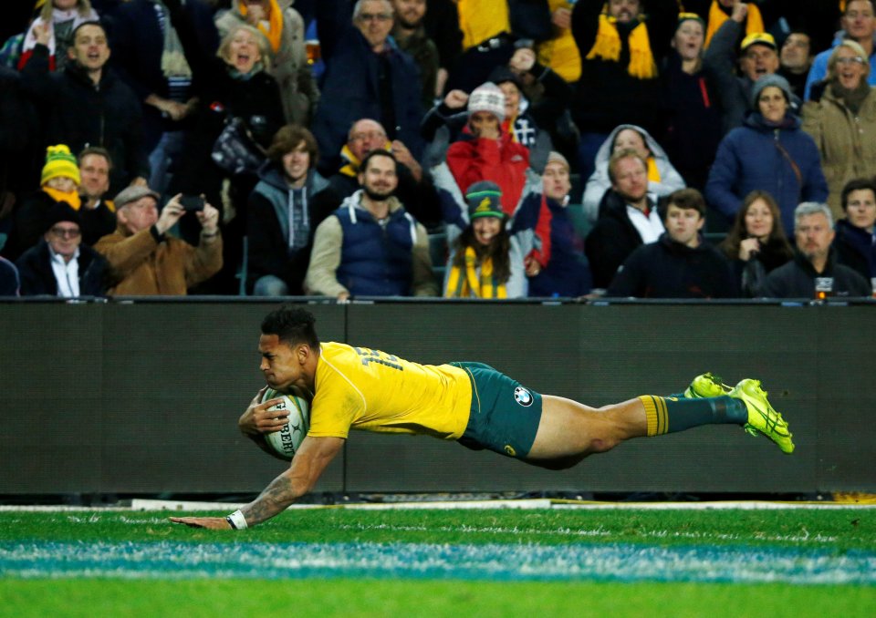  Israel Folau burst through tackles to score a try