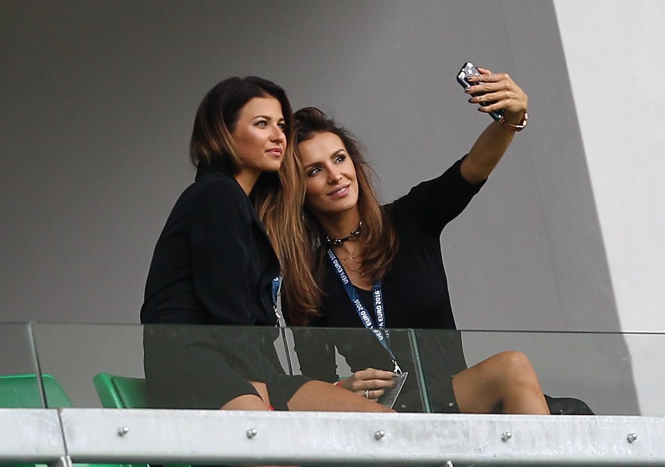  Polish striker Robert Lewandowski's wife Anna (left) and Polish keeper Wojciech Szczesny's wife Marina pose for a selfie