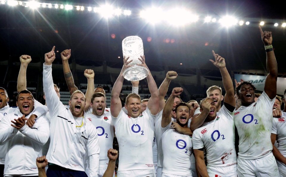  England players celebrate with the Cook Cup after their whitewash of Australia