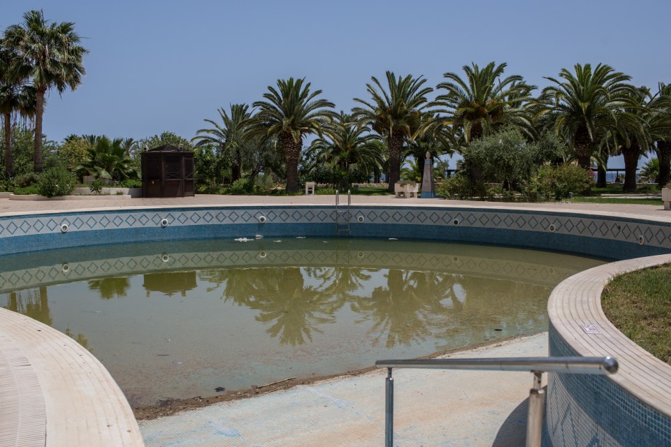  Shallow green water stand in the outdoor pool where Rezgui gunned down holidaymakers with a Kalashnikov