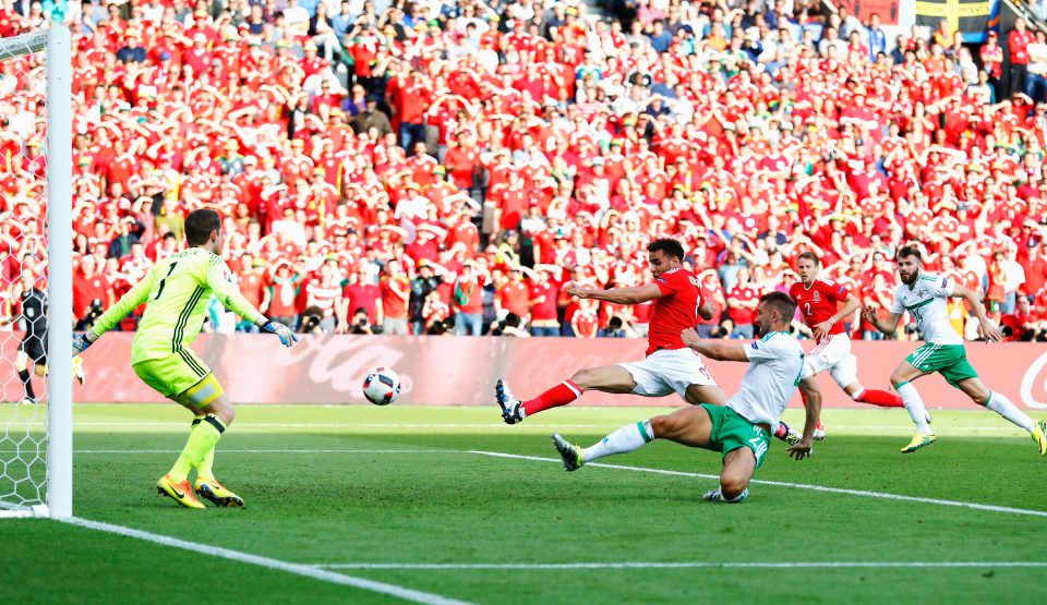  Gareth McAuley turns Gareth Bale's low cross into his own net