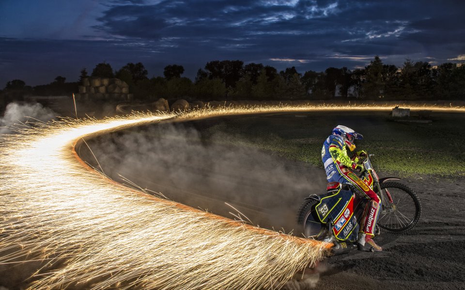  This incredible action shot shows sparks flying as Przemek Pawlicki performs during training in Leszno, Poland