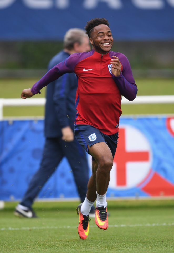  Raheem Sterling is all smiles during an England training session