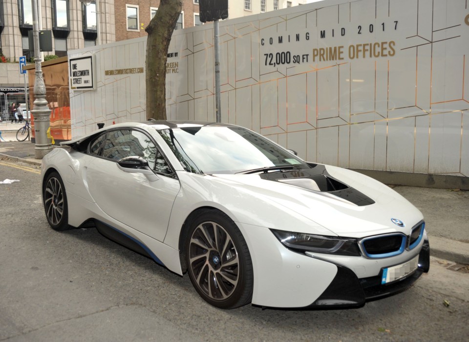 FAMEFLYNET - Exclusive: UFC Fighter Conor McGregor Seen Arriving In His BMW i8 At The Mansion House