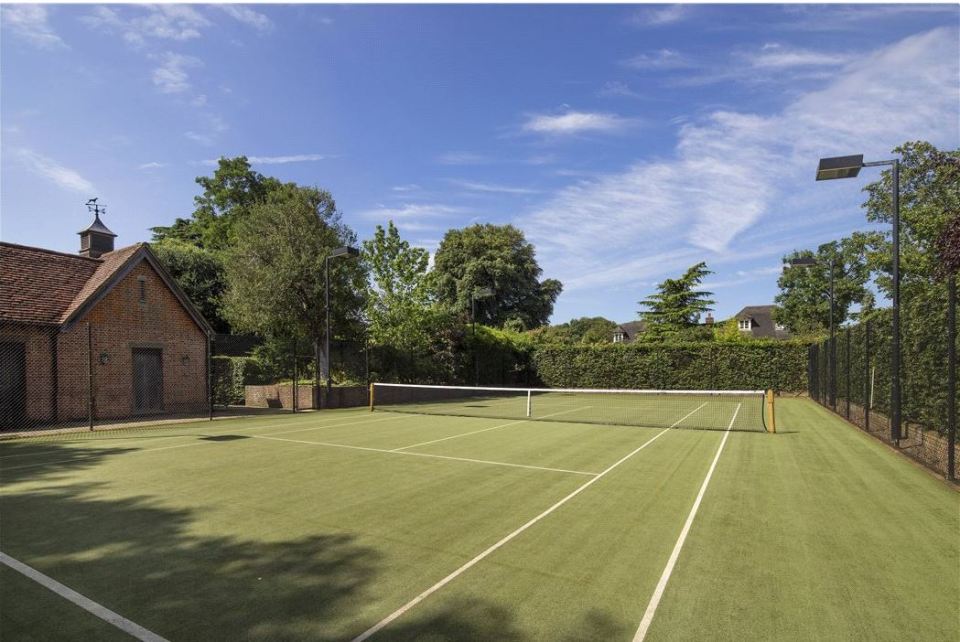  The home has its own tennis court... as well as being down the road from the Wimbledon club