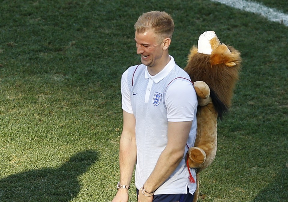  Error-prone goalkeeper Joe Hart with Leo on his back