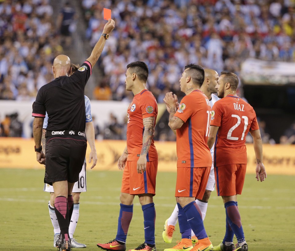 Marcelo Diaz sees red for a second bookable offence with both fouls on Lionel Messi