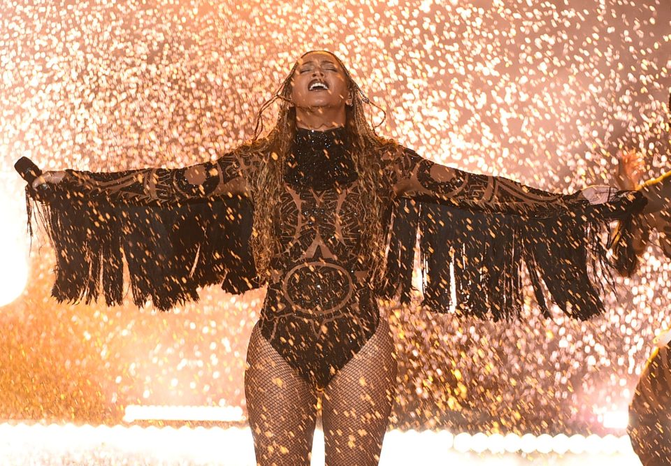  Her sheer sequined bodysuit revealed tasselled sleeves