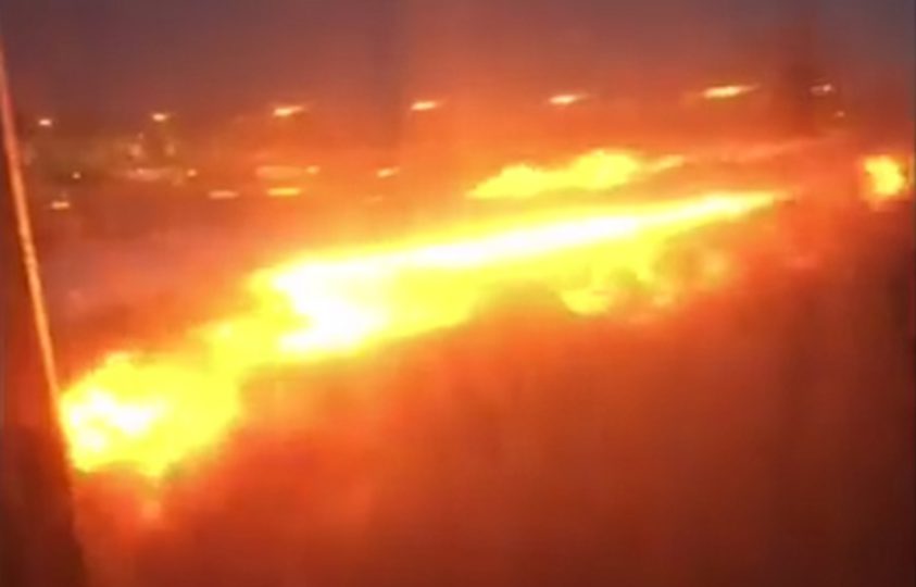  Passengers on board a Singapore Airlines jet filmed the terrifying moment its right wing bursts into flames while making an emergency landing