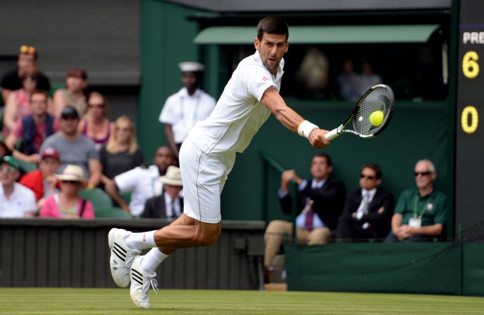  Novak Djokovic returns during his Wimbledon opener against James Ward