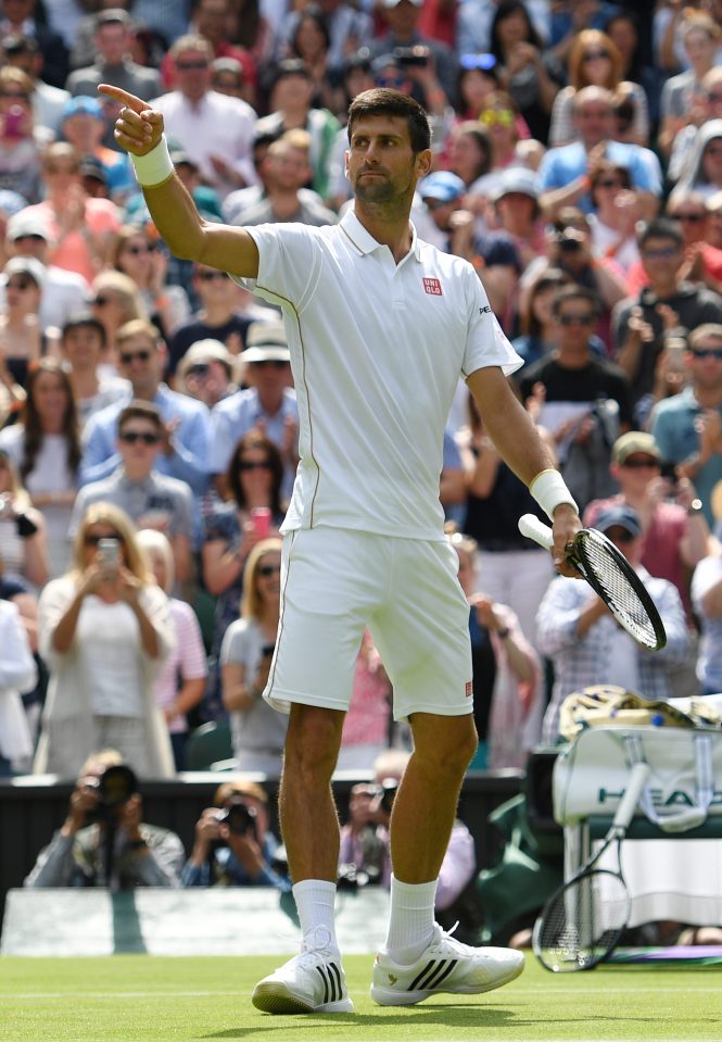  Novak Djokovic celebrates after beating James Ward in Wimbledon opener