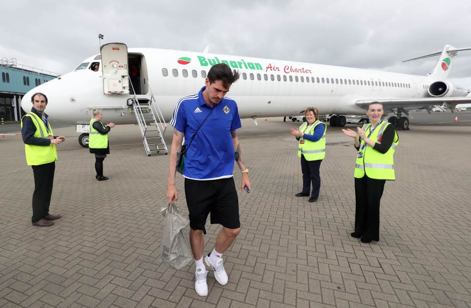  Kyle Lafferty cuts a solemn figure returning home after Euro 2016 heartbreak