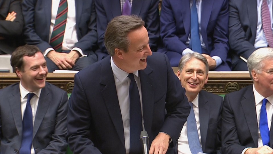  House of fun ... Cameron laughs in the Commons