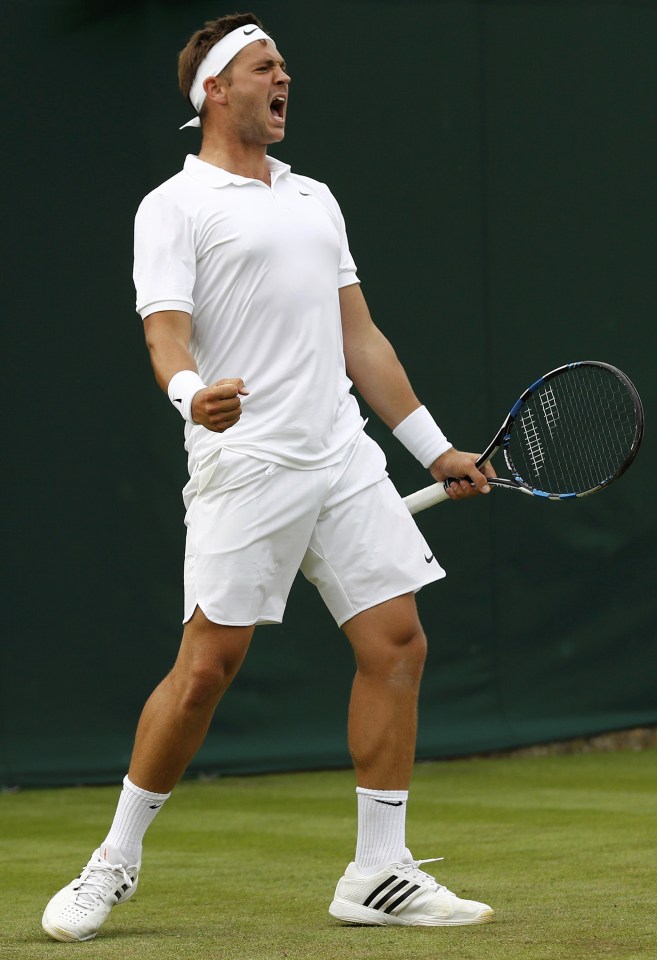 Marcus Willis celebrates after winning his match against Lithuania's Ricardas Berankis 