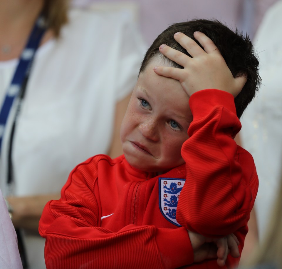  Six years of hurt... Kai Rooney watches his dad and his teammates fall apart on the pitch