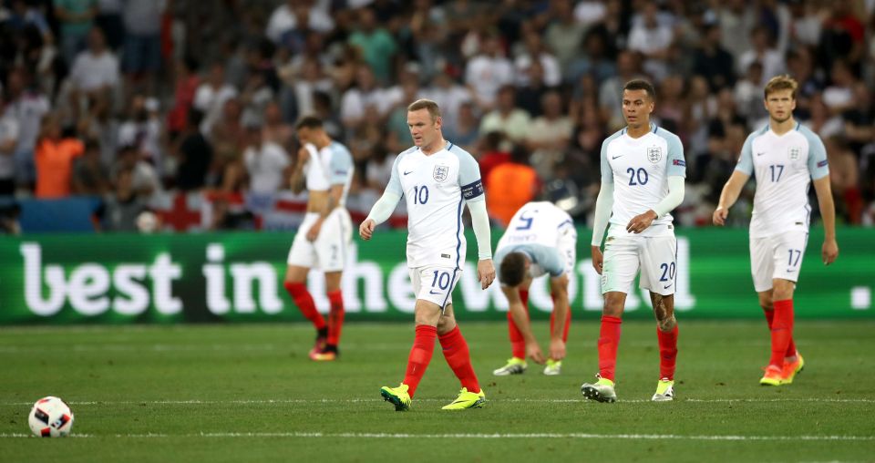 England players trudge back for the kick-off after Iceland took the lead