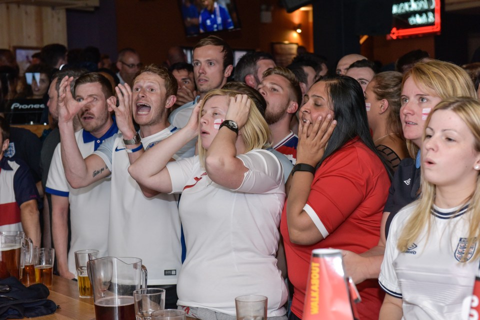  Bitter . . . anguished England supporters see game in a Birmingham pub