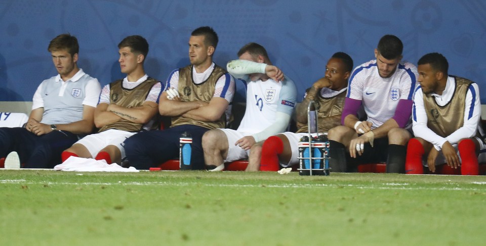 Wayne Rooney and the England bench look dejected as the team crashed out in humiliating fashion against Iceland