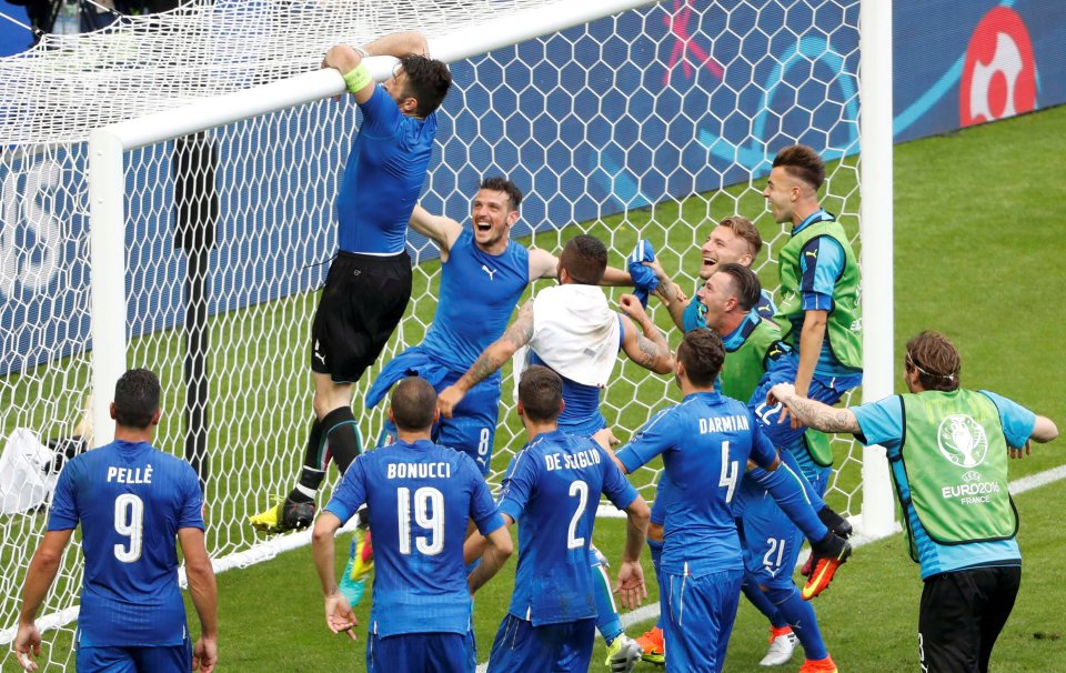  Gianluigi Buffon jumps on the crossbar as Italy celebrate eliminating Spain