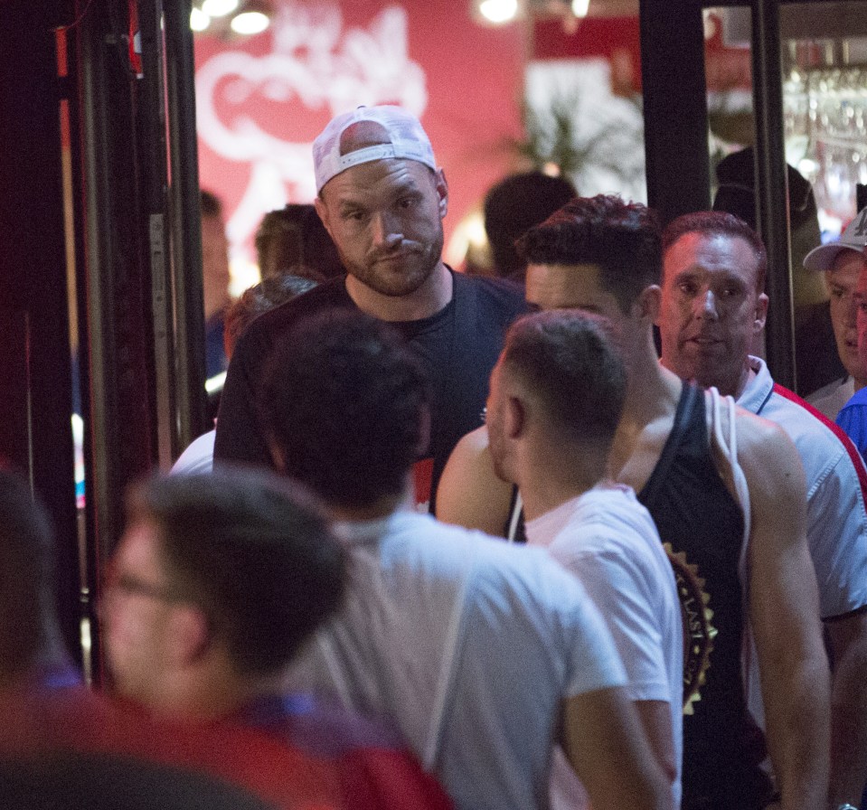  Tyson infuriated... Heavy weight champ walks through Nice after England loss