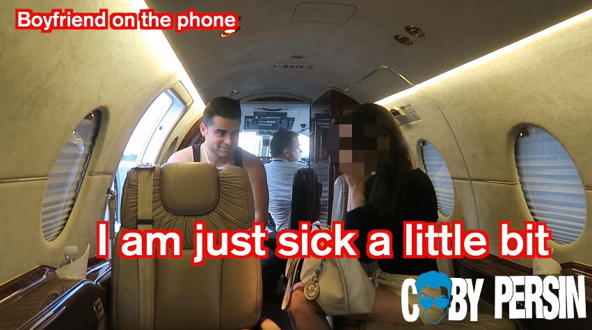  On the private jet, the girl lies to her boyfriend, telling him that she's sick