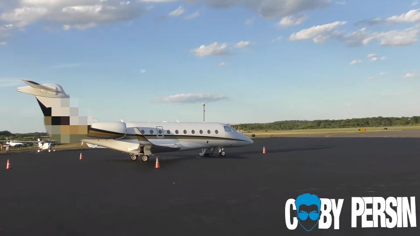  The car pulls up beside the private jet at the airport